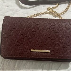 Brown Clutch with Embossed Texture and Gold Hardware Aldo